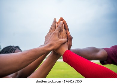 Closeup Of Group Of Black People Hands Meeting