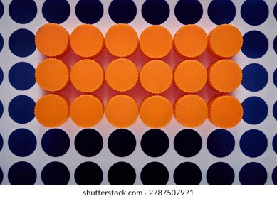 Close-up of a group of translucent polypropylene laboratory vials placed in a rack, for the examination of medical samples and laboratory experiments.