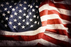 Closeup of grunge American flag, a Photo by STILLFX