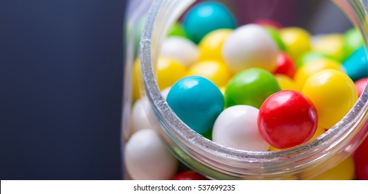 Closeup Gum Balls In Container