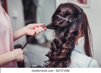 Closeup Hairdresser Coiffeur Makes Hairstyle.