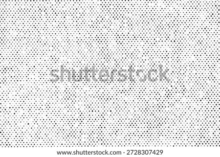 Close-up of a halftone dot pattern with consistent spacing and low ink density, forming a soft monochrome texture on white paper.