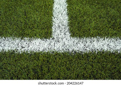 Closeup Halfway Line Of A Football Field 