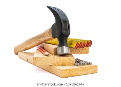 Close-up of hammer and carpenter's tools on a white background. Construction industry, do it yourself. - Shutterstock ID 1593361447