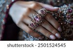 Close-Up of a Hand Adorned with a Gemstone Ring suitable for business background, posters, wallpapers, banners, greeting cards, and advertising for business entities or brands.