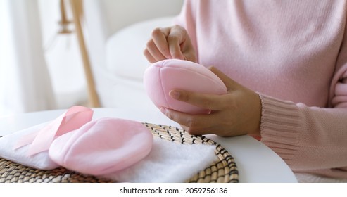 Close-up Hand Asia Woman Help Make Craft Pink Single Fill Up Bra Cup Insert For Post Mastectomy Prosthesis Surgery MRM At Home. Relief Work Service Support Give Hope To Tumor Patient Medical Issue.