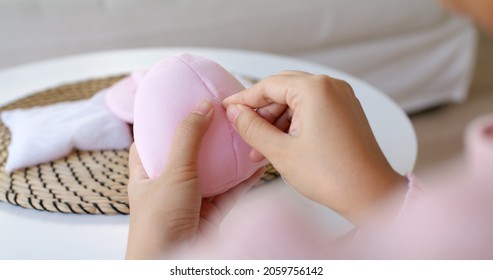 Close-up Hand Asia Woman Help Make Craft Pink Single Fill Up Bra Cup Insert For Post Mastectomy Prosthesis Surgery MRM At Home. Relief Work Service Support Give Hope To Tumor Patient Medical Issue.