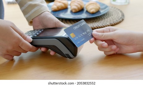 Close-up Hand Asia Woman People Work In Small Sme Coffee Cafe Shop Store Owner Use Cashless Wifi Paywave Nfc Scan App Smart Pos Reader Sale In Take Out Food Drink Order In Urban City Life Contactless.