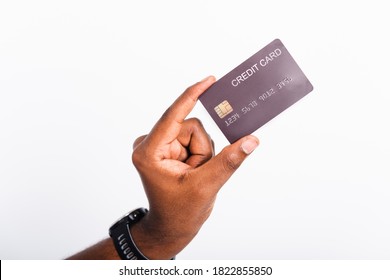 Closeup Hand Black Man Holding Bank Mockup Money Credit Card On Hand For Payment Transfer, Studio Shot Isolated On White Background