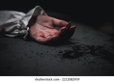 Closeup Hand With Blood Of Horror Bloodthirsty Ghost Woman On Floor, Homicide Female Hands Jerky In Blood With Resentment Torture And Ask For Help, Murder And Crime, Halloween Horror Day Concept