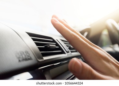 Closeup Of Hand Checking The Air Conditioner In The Car, The Cooling System In The Car