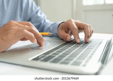 Closeup hand coding programing computer software. Using online connect technology for business or education and communication. 