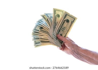 Close-up hand fanning out stack of twenty dollar bills against bright white background
