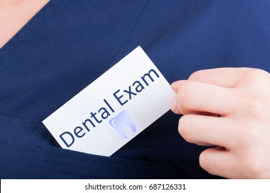 Closeup Hand Hold Visit Card With Dental Exam As Periodic Appointment Concept