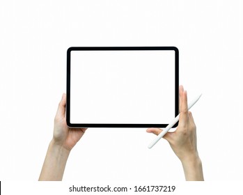 Close-up Of Hand Holding Black Tablet Isolated On White Background.