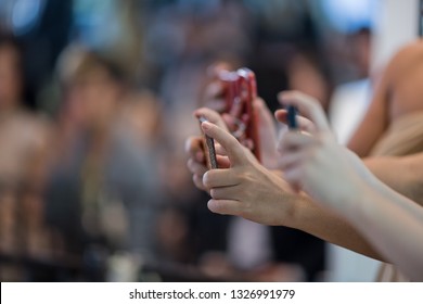 closeup hand holding cellphone, women play smartphone, typing phone, very busy time, online shopping,  - Shutterstock ID 1326991979