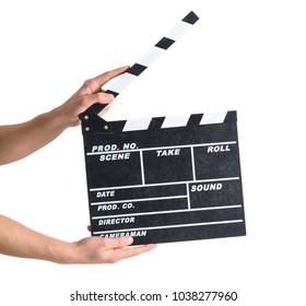 Close-up Of Hand Holding Clapper Board Over White Background