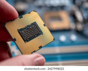 Close-Up of Hand Holding a Computer Processor Chip
