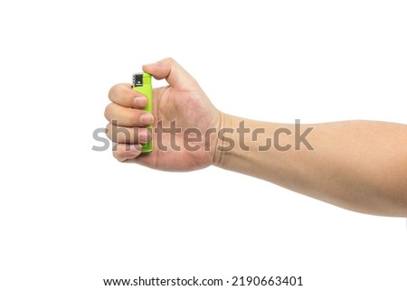 Closeup of hand holding green plastic lighter isolated on white background