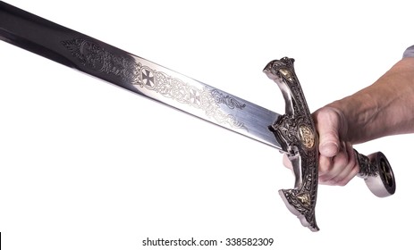 close-up of a hand holding a medieval sword - Isolated