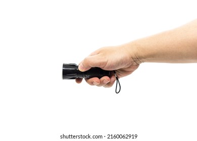 Closeup Of Hand Holding Small Black Flashlight Isolated On White Background