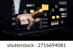 A close-up of a hand interacting with a digital interface that illustrates data management concepts, showcasing innovation and modern business strategies. Gantry