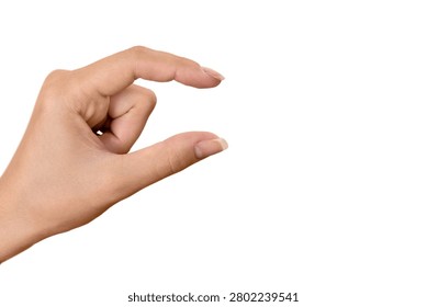 Close-up of a hand making a snapping or picking motion on a white background