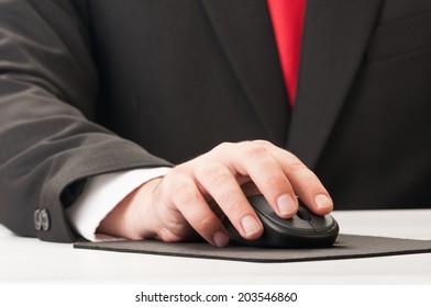 Closeup Of Hand And Mouse, Suit And Tie.