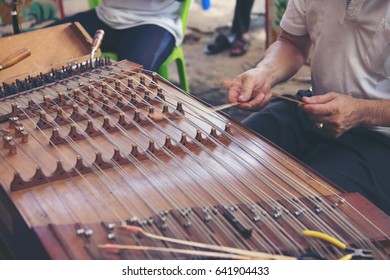 Closeup Hand Play Hammered Dulcimer