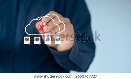 Close-up of a hand pointing at a cloud system error icon with data file failure alerts. Concept of cloud outage, cybersecurity risk, and system failure notification.