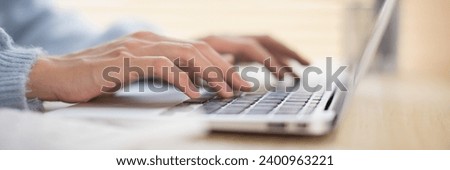 Similar – Image, Stock Photo Detail of hands texting with mobile phones green and blue with computers behind. Messaging apps.