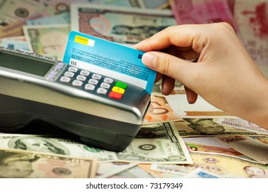 Closeup Of  Hand Putting Credit Card Into Payment Machine.  Electronic  Wallet Is Growing Up . Paying By Credit Card Is Standard Service For Custommer