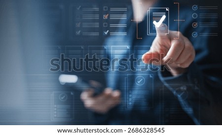 Close-up of a hand selecting a digital document with a checkmark icon on a virtual interface, symbolizing file conflict resolution, version control, cloud workflow, approval.