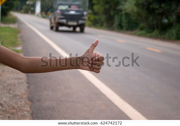 Closeup of Hand sign call a\
car.