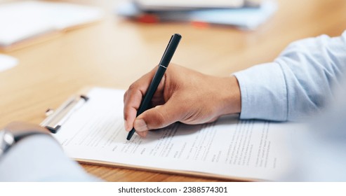 Closeup, hand and signature for clipboard in office for writing on legal form, compliance or application. Person, lawyer or document by information, reading or agreement by contract paperwork on desk - Powered by Shutterstock