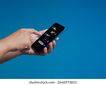 Close-up of hand tapping chatbot conversation on smartphone screen, perfect for artificial intelligence, customer service, messaging, and modern digital technology visuals.
