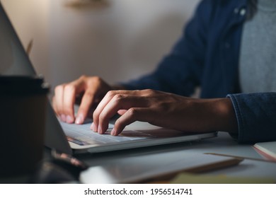 Closeup hand using computer laptop. Using online connect technology for business, education and communication. 