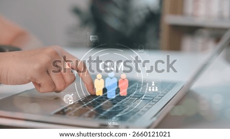 Close-up hand using CRM system on laptop, integrating customer data, communication tools, and performance tracking for digital marketing and business growth strategies.