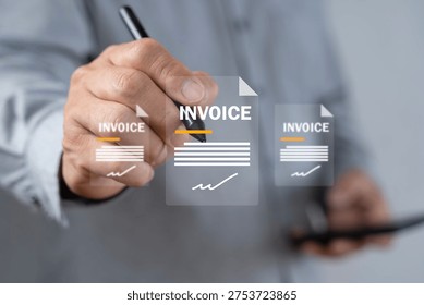Close-up of a hand using a stylus and tablet with invoice overlays, representing e-invoicing, digital billing, paperless accounting, approval, payment processing, and business workflow.