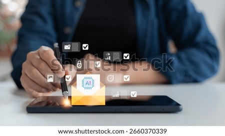 Close-up of a hand using a tablet with an AI email icon and checklist interface, symbolizing smart automation, email management, AI workflow, and digital productivity tools.