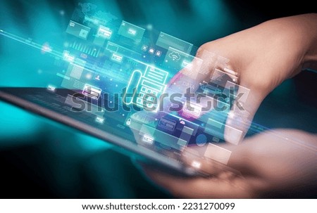 Close-up of a hand using tablet, currency concept
