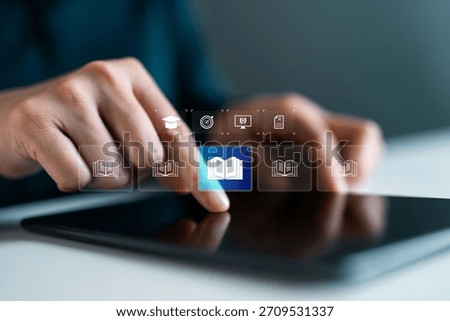 Close-up of hand using tablet with virtual book icons, symbolizing online learning, digital education, e-book access, virtual library and smart content management for modern learners.