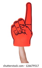 Close-up Of Hand Wearing Foam Finger Isolated On White Background