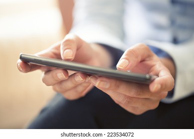 Close-up of a hand woman using smart phone - Shutterstock ID 223534072
