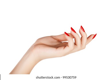 Closeup Of Hand Of A Young Woman With Long Red Manicure On Nails Against White Background