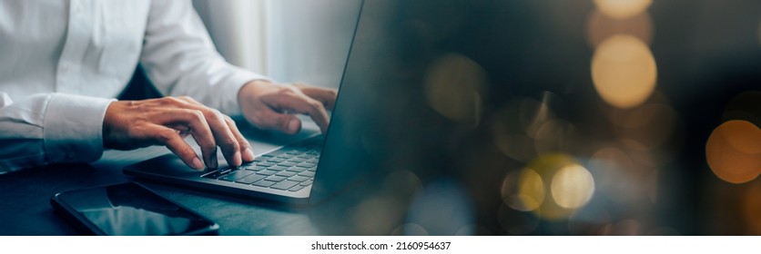 closeup hands of businessman working at office, Man typing keyboard on laptop or computer, Banner cover design. - Powered by Shutterstock