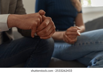 Close-up of hands during an emotional moment. Could represent therapy, counseling, support in relationships, or any situation requiring trust and empathy. Subtle gestures - deep emotional connection. - Powered by Shutterstock