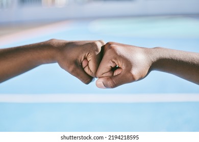 Closeup Of Hands, Fist Bump And The Teamwork Of Two Athletic, Sporty, And Active Male Athletes. Team Of Black People, Friends Or Teammates Working Together Showing Respect, Collaboration And Support