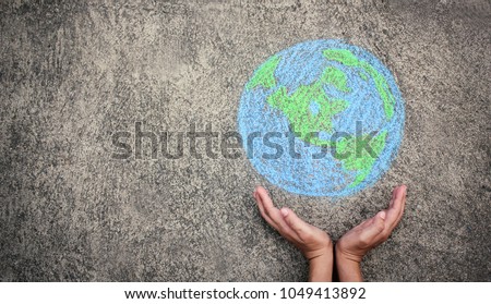 Closeup hands holding earth draw with chalk. World harmony green peace environment earth day together, sustain ecology, climate change, save the world, ecosystem social network concept banner.