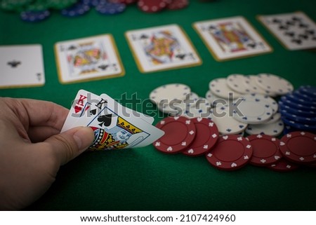 Closeup of hands with kings, Texas Hold'em Poker gambling concept